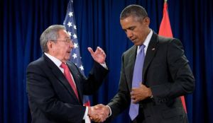 In their face-to-face meeting, Raul Castro expressed optimism for greater co-operation between two countries, then discreetly pointed out to Mr. Obama that his fly is undone. Image credit: Washington Times